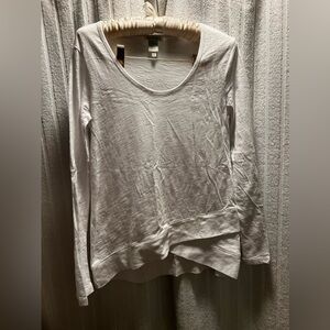 Sundance small white long sleeve shirt. Cute wrapped look on bottom.